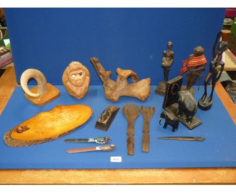 A quantity of Treen to include: a tree trunk, driftwood, ethnic figures, plus a cast door wedge with a mouse, rams horn on a 