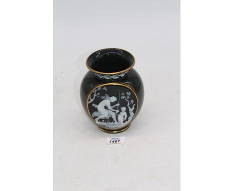 Attributed to George Jones, a pate-sur-pate Vase of moon flask form decorated with a classical scene against a black ground, 