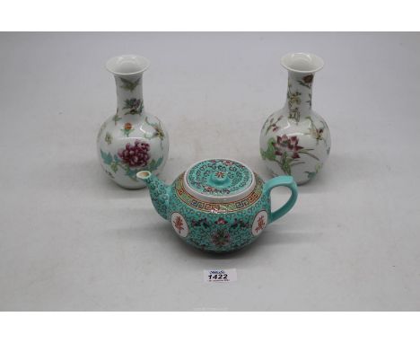 A pair of Chinese porcelain bottle vases painted with peony insets, 7" tall, stamp on base, and a Chinese turquoise raised de