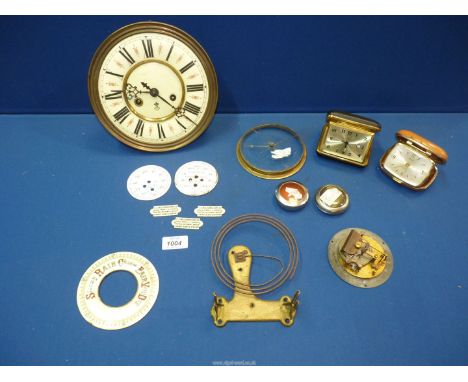 A quantity of clock and barometer parts, to include: a Gustav Becker 7" Vienna regulator movement. two vintage travel alarm c
