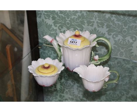 A Franz porcelain daisy pattern teapot, jug and sugar bowl.