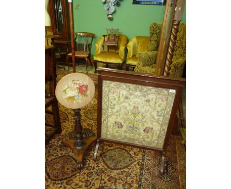 An 18th c. Mahogany Pole Screen with baluster carved column on triform base and scroll feet with perhaps original tapestry on
