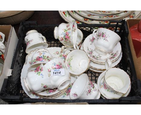 A six place setting Royal Albert "Moss Rose" teaset (some chips) and three Lavender Rose cups and two saucers.