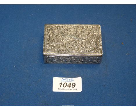 An interesting 19th century metal sweetmeat/snuff Box with all over decoration of scrolling foliage and gilt wash interior, 3