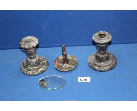 A pair of turned stone dumpy Candlesticks, 4 5/16" high and a ring stand, the pillar in the style of a lighthouse, 3 1/2" hig