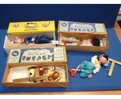 Three boxed Pelham Puppets to incl. 'Wags' Dog type LA, Policeman, etc., plus another unboxed and unnamed puppet.