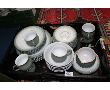 A quantity of "Denby" green dinner service to include: plates, bowls, cups and saucers, etc.