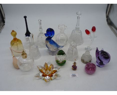 A quantity of glass to include: Caithness "Pixie" paperweights, bells, atomizer, a duck paperweight, etc.