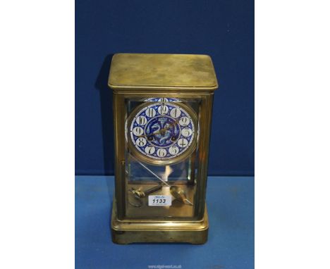 A circa 1870's century French mantle clock by Victor, brass cased, the dial attractively enamelled in blue with a pair of dra