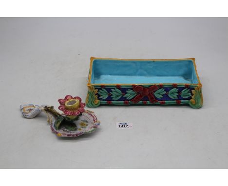 A Majolica flower trough with turquoise interior  11" long x 5" wide, plus a tin glaze chamber stick in the form of a head an