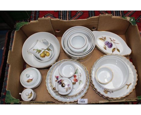 A quantity of Royal Worcester "Evesham" china to include: flan dishes, souffle dishes, chocolate pots, ramekins, etc.