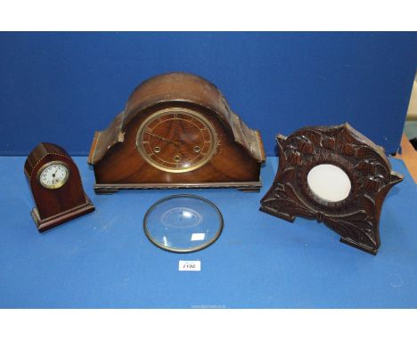 A Mantle Clock with pendulum and key (as found), a small USA mantle clock and a carved floral wooden clock surround, etc.