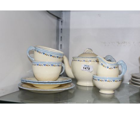 A 1930's Newhall Hanley Teaset to include: teapot, two cups and saucers, sugar bowl, cream jug and side plate "Diana" pattern