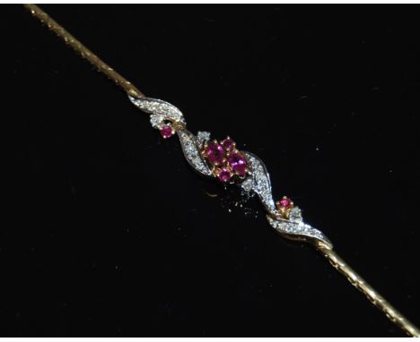18CT RUBY AND DIAMOND BRACELET.
