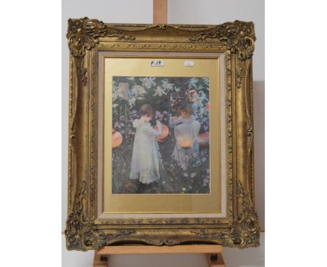 PRINT OF 2 GIRLS IN A GARDEN HOLDING LANTERNS, IN A GILT FRAME. 30 X 25CM.