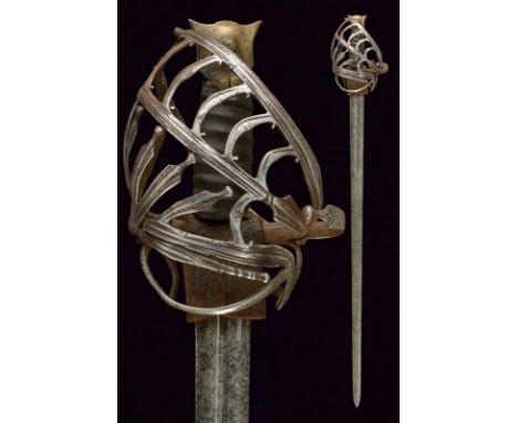 dating: 18th Century provenance: Venice, Wide, straight, double-edged blade with central groove in the first part featuring b