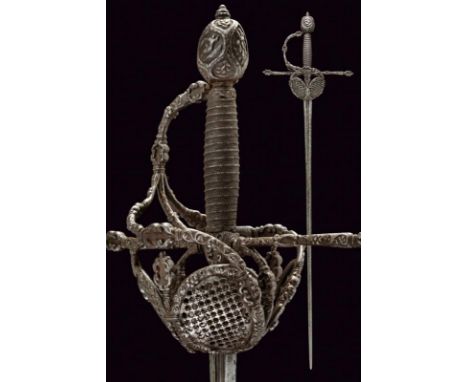 dating:  provenance: Germany, Straight, double-edged blade, first part with two decorated grooves, engraved with cross on a s