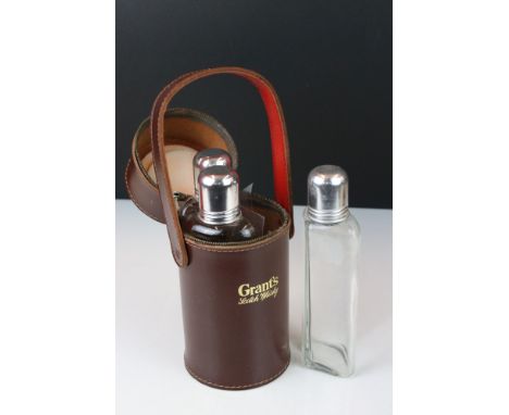 Grant's Scotch Whiskey, Set of Three Whiskey Glass Spirit Flasks contained in a leather cylindrical case 