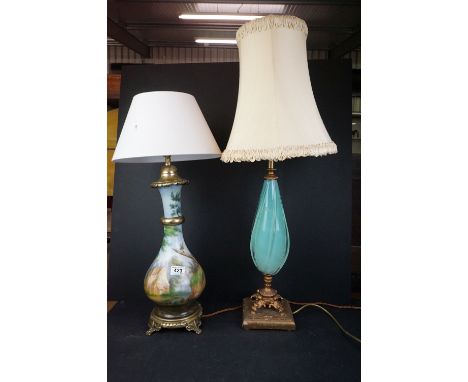 Two decorative table lamps to include a ceramic example with hunting scene. 