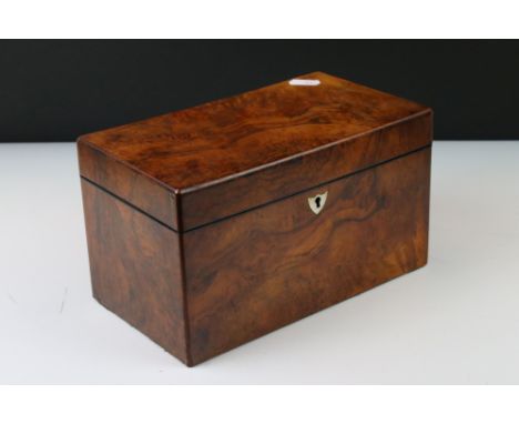 Early 19th century Walnut Tea Caddy of square form, the hinged lid opening to a single lidded compartment  and a glass mixing