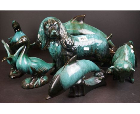 A collection of Blue Mountain ceramic animals to include Dolphins, Bison and a dog. 