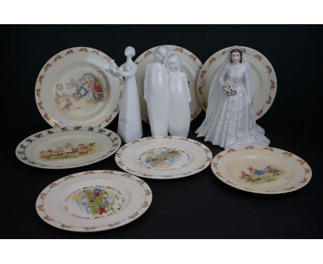 A collection of Royal Daulton to include Bunnykins plates and sculpted figures together with a Royal Worcester figurine. 