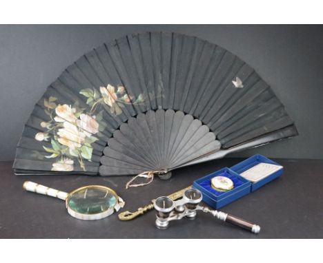 A box of mixed collectables to include opera glasses, Halcyon Days enamel trinket box and a magnifying glass. 