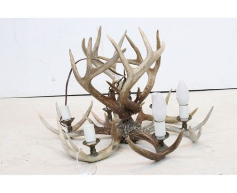 Ceiling light made from ten deer antlers 
