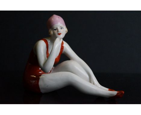 Ceramic Art Deco style figure of a young lady 