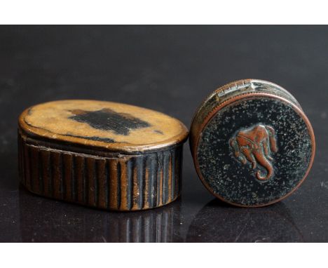 An antique hand carved wooden snuff box together with a Eastern Foam powder compact. 