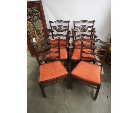 A set of six early 19th century dining chairs (two carvers), with pierced top rails and ladder splats, raised on square strai