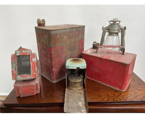 A Selection of vintage lanterns and fuel cans to include BP Petrol can, small stove and unusual red painted heater. 