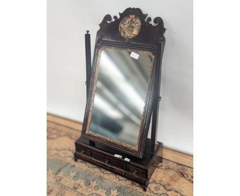 A bold design regency antique adjustable dressing table mirror, with decorative gilt molding, upon a three drawer platform 