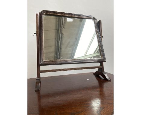 A Georgian table top mirror. Designed with gilt mould trim. [46x44cm] 