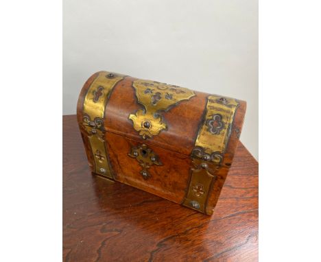 A 19th century bur walnut dome top tea caddy chest. Designed with brass mounts. [17x23x11cm] 