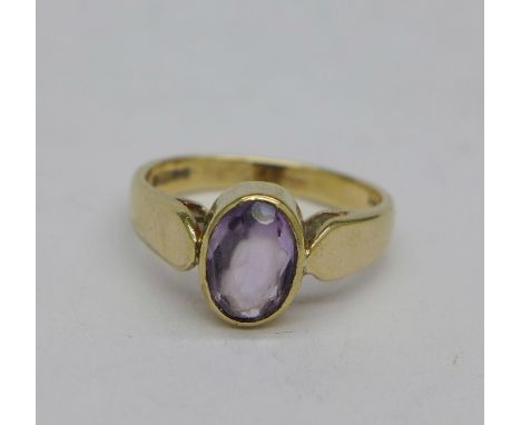 A 9ct gold and amethyst ring, 3.4g, L