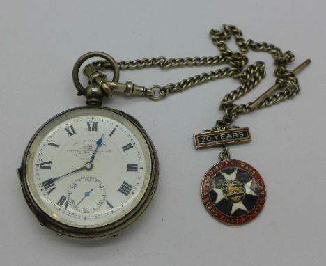 A silver cased Thos. Russell & Son pocket watch with silver double Albert chain and enamel British Railways fob