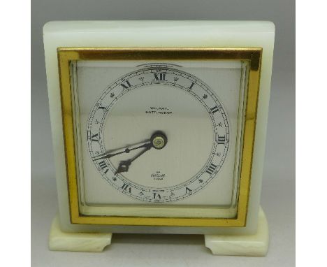 An onyx cased Elliott mantel clock, retailed by W.H. May, Nottingham