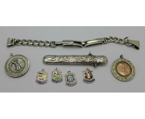 Two silver fobs, golf and darts, a 925 silver needle case, four charms and an expanding watch strap marked Army