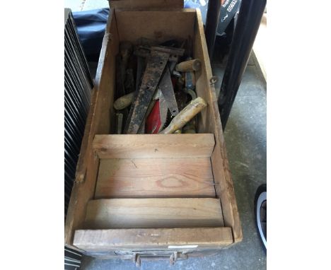 AN OLD WOODEN BOX OF TOOLS