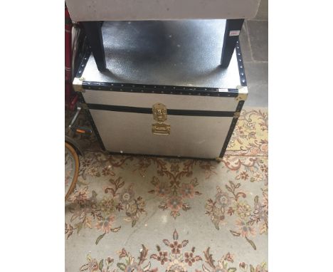 A LARGE TRAVEL TRUNK