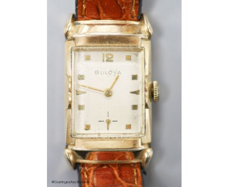   A gentleman's 1930's 10k rolled gold Bulova manual wind rectangular dial wrist watch, with subsidiary seconds, on later lea