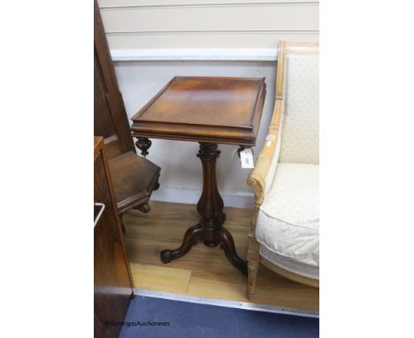   A Victorian rectangular mahogany tripod table, width 48cm, depth 38cm, height 76cm