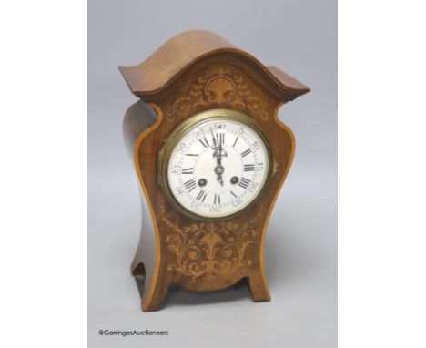  An Edwardian marquetry inlaid mantel clock, height 32cm