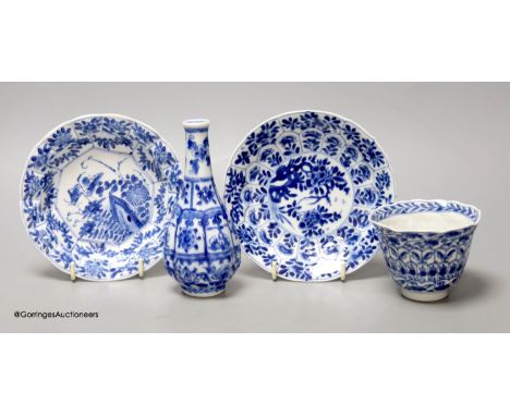   A Chinese blue and white plate 13cm diameter, a similar tea bowl and saucer, Kangxi period and a 19th century Chinese blue 