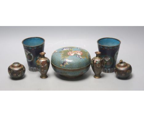   A Chinese cloisonne enamel box &amp; cover, two beakers and four similar Japanese miniature vessels