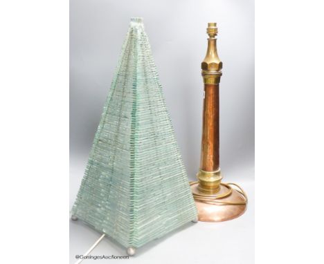   A large copper and brass hose lamp and a modern glass pyramid lamp, tallest 56cm