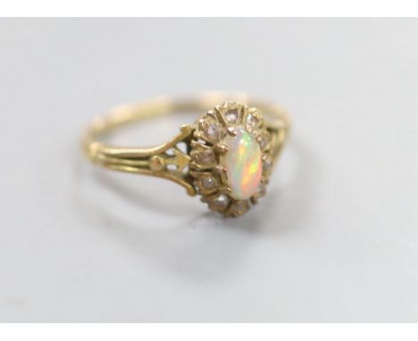   An early 20th century Austro Hungarian? yellow metal, opal and rose cut diamond set oval dress ring, size P, 2.7 grams.