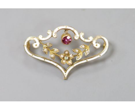   An Edwardian 9ct, enamel, seed pearl and gem set drop scroll brooch, 33mm, ross weight 2.6 grams(a.f.).