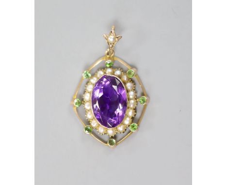   An early 20th century yellow metal, amethyst, split pearl and green stone set oval pendant, in the Suffragette colours, ove